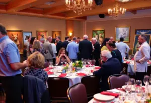 Guests at the Tucson Charity Gala enjoying pet portrait auctions.