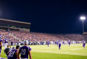 Football game at Tucson High Stadium featuring Badgers vs Falcons under bright lights