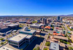 Aerial view of Tucson's Innovation Corridor with conference venues and cultural landmarks.